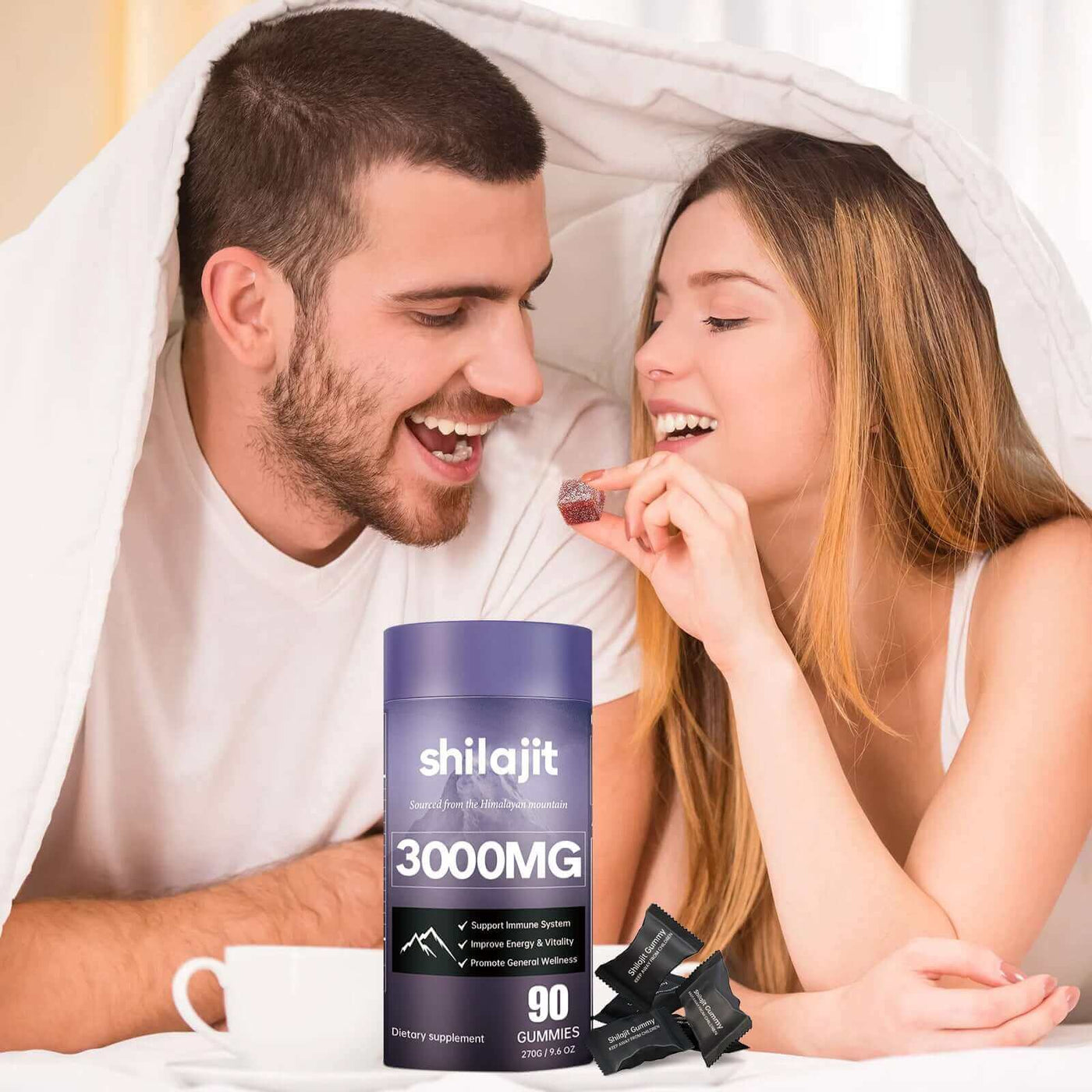 Couple enjoying Shilajit 3000MG soft candy for improved energy and resistance, with 90 gummies in packaging.